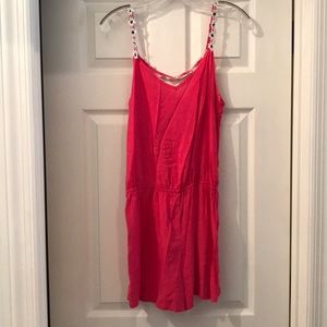 Hot pink spaghetti strap romper with open back
